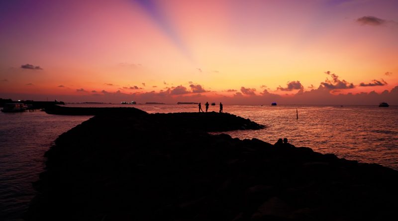 Beach Sunset Silhouettes Island  - glynhupalo / Pixabay